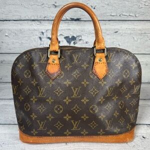 Louis Vuitton Alma Brown Monogram Canvas Leather Handbag
